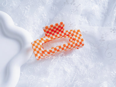 Orange checkered hair claw