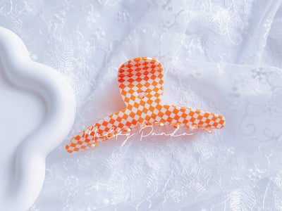 Orange checkered hair claw