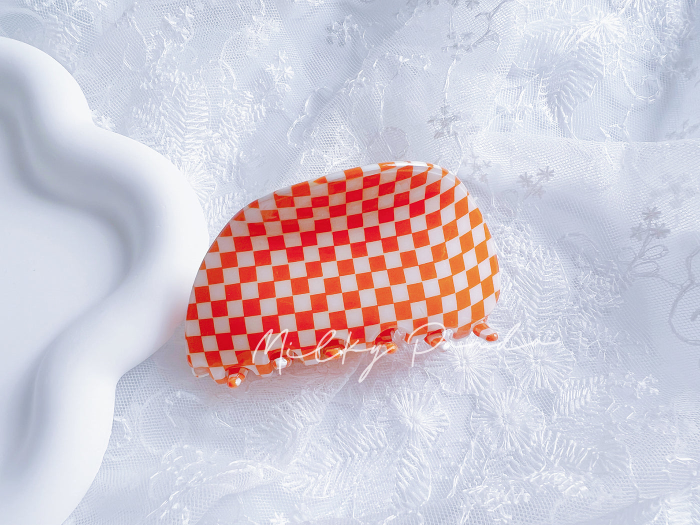 Retro orange checkered hair claw