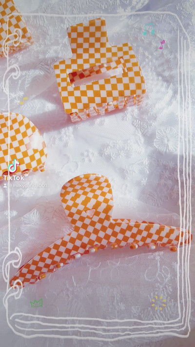 Orange checkered hair claw